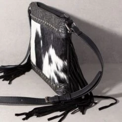 Trinity Ranch Floral Tooled Black Cowhide Crossbody 9 Trinity Ranch Floral Tooled Black Cowhide Crossbody -Western Cowboy Equipment Shop 849153 side A